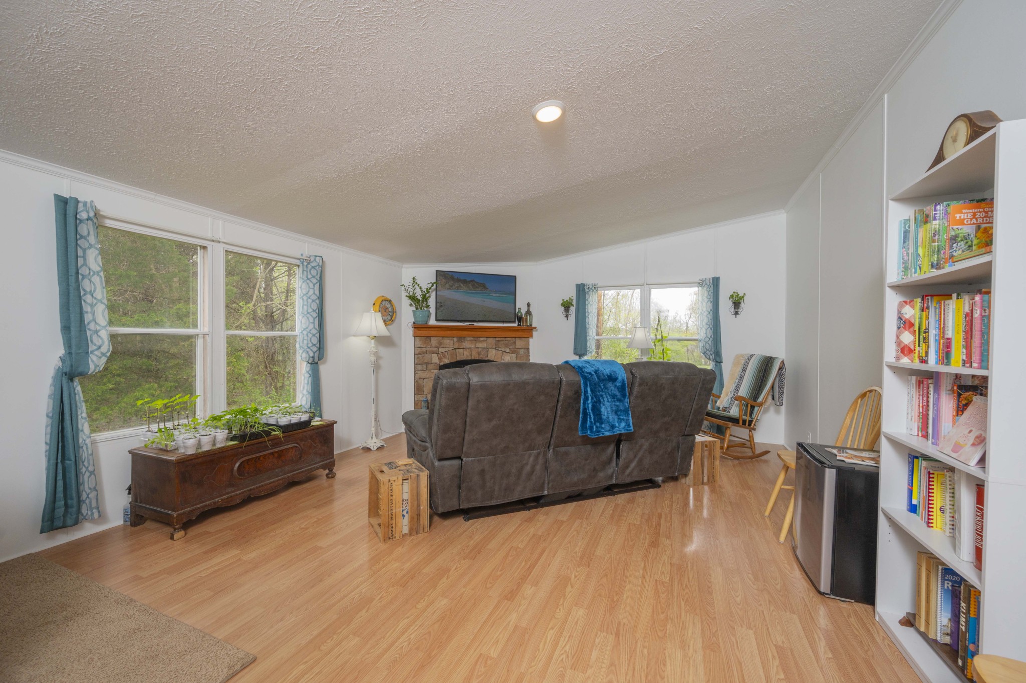 1822 Groveland Ridge Road Columbia, TN 38401 - Photo 35 of 48 a living room with furniture window and a book shelf