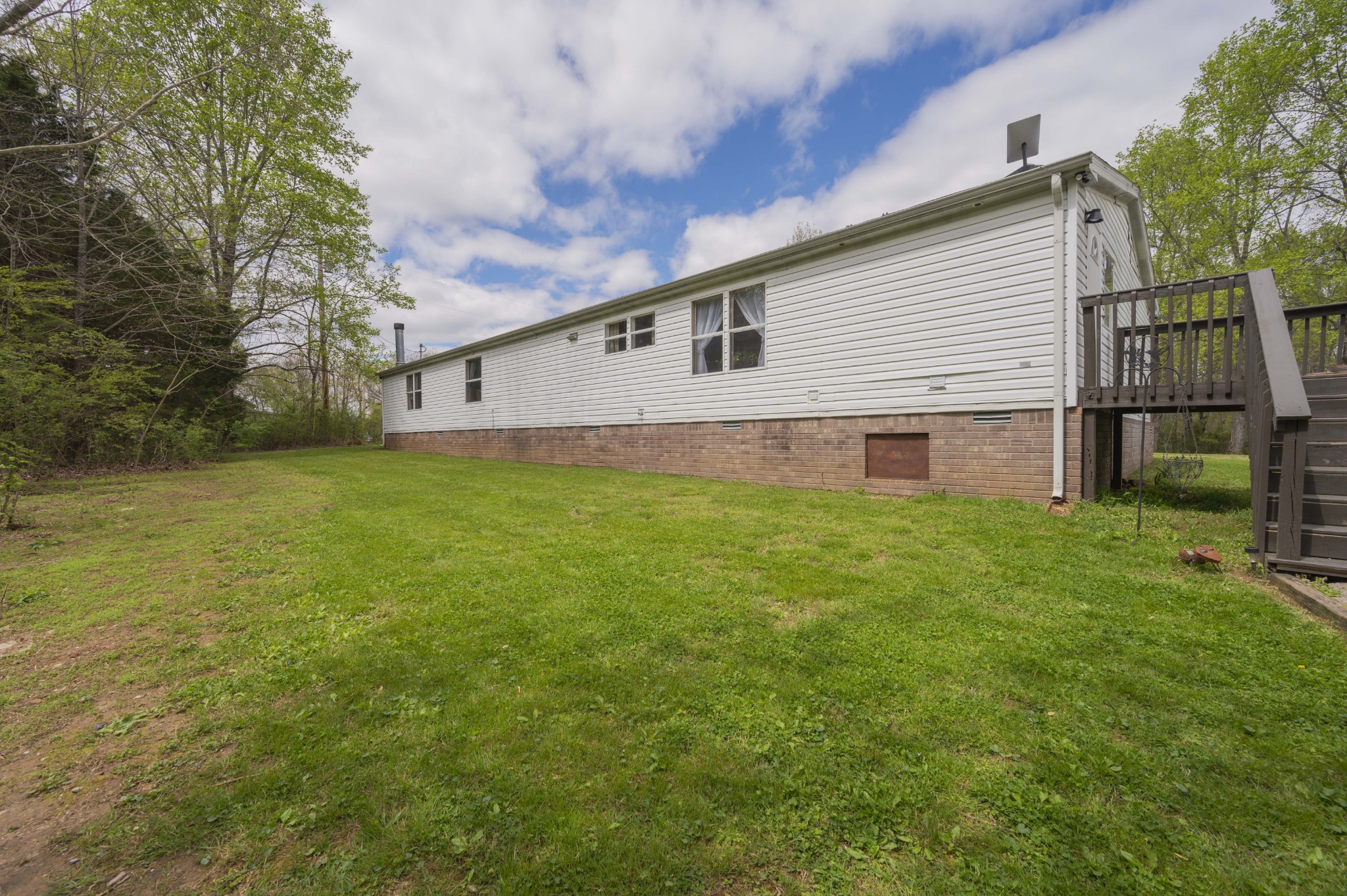 1822 Groveland Ridge Road Columbia, TN 38401 - Photo 43 of 48 a front view of house with yard and trees in the background