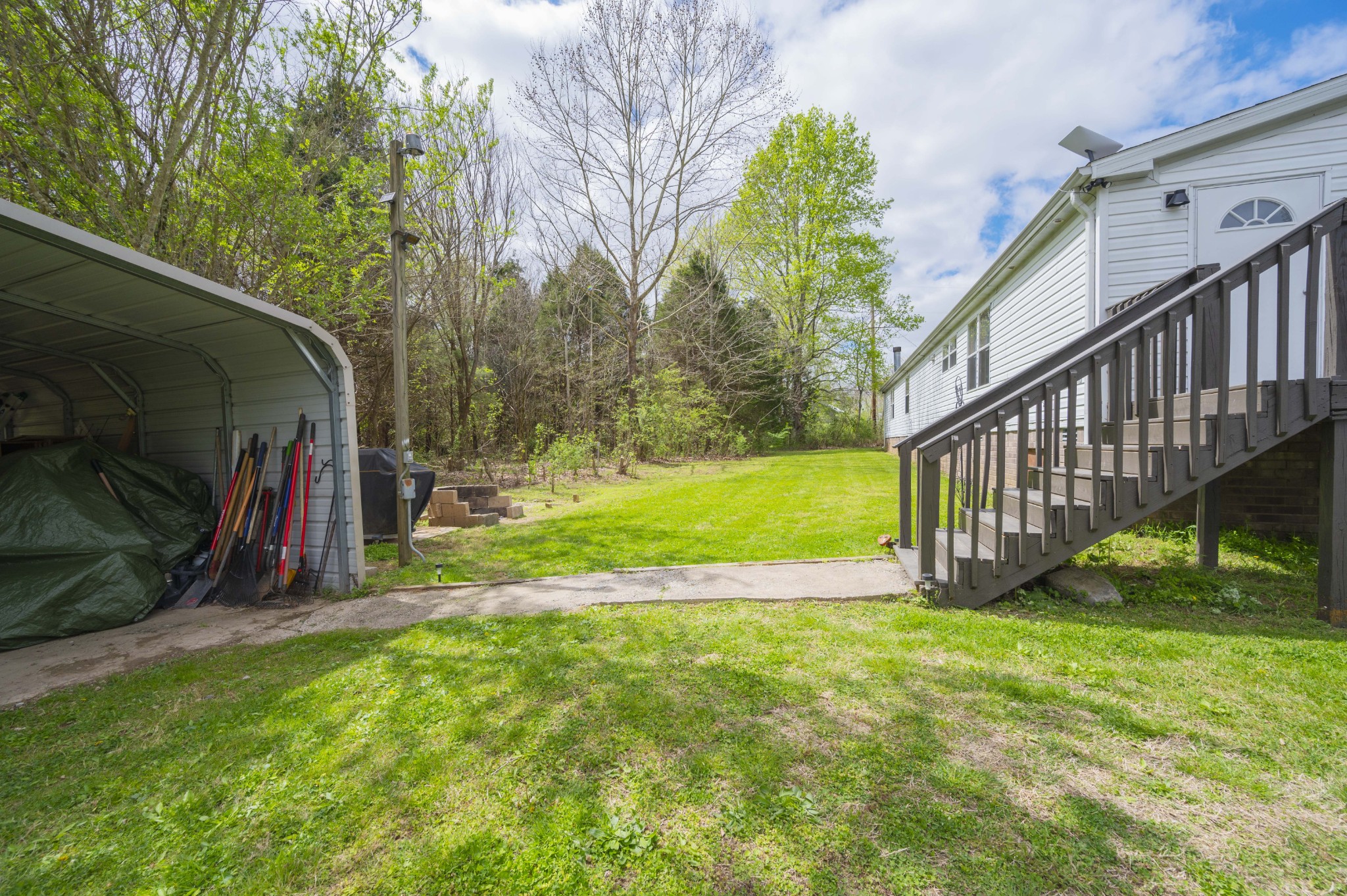 1822 Groveland Ridge Road Columbia, TN 38401 - Photo 46 of 48 a view of yard with swimming pool and deck