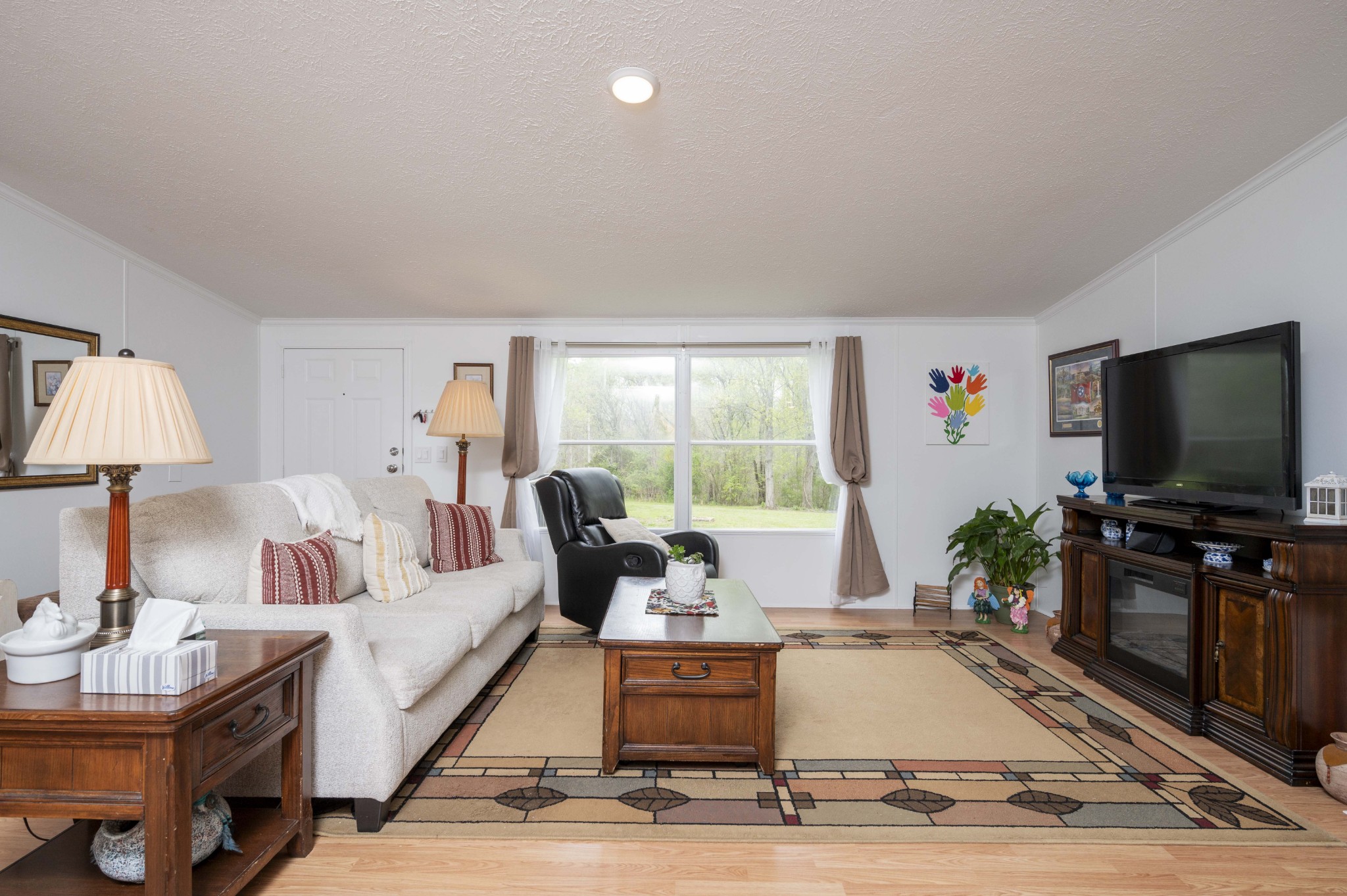 1822 Groveland Ridge Road Columbia, TN 38401 - Photo 5 of 48 a living room with furniture and a flat screen tv