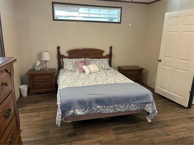 a view of a room with a table and chairs