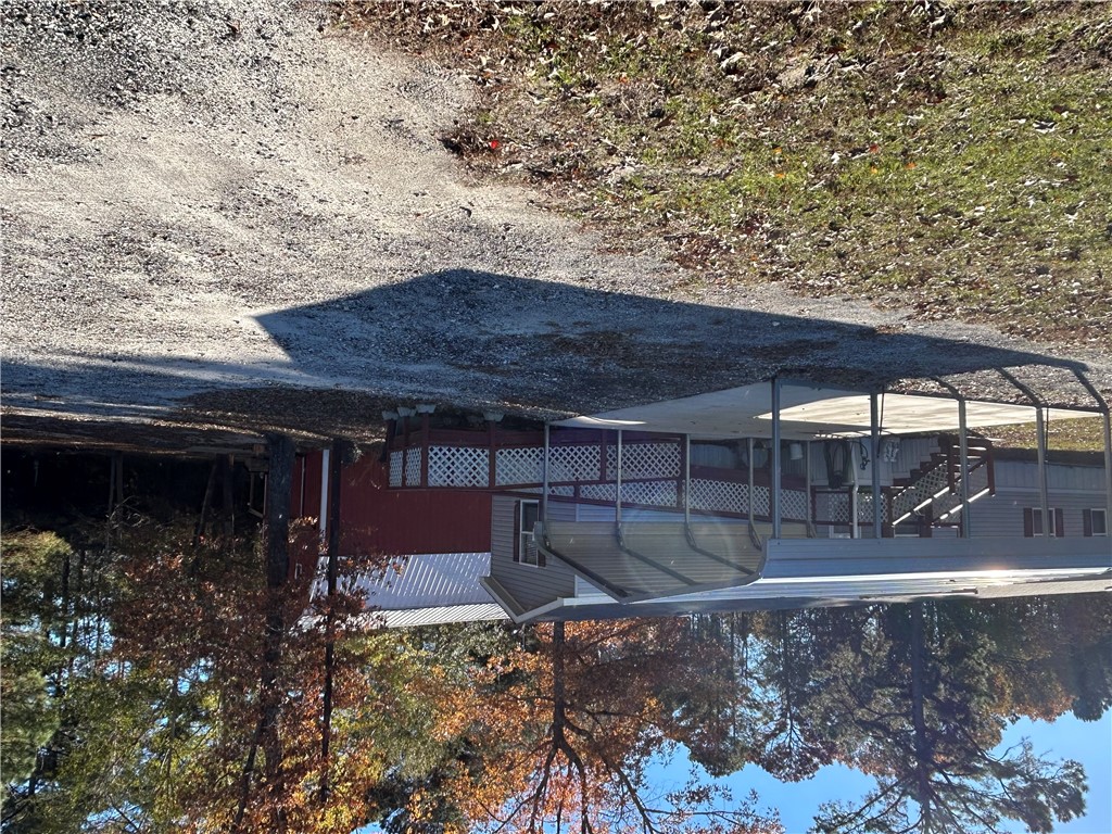 19730 County Road 2202D Tatum, TX 75691 - Photo 38 of 46 a view of a house with a yard