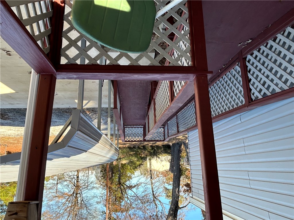 19730 County Road 2202D Tatum, TX 75691 - Photo 40 of 46 a view of a wooden bench next to a yard