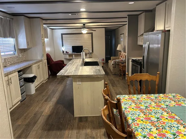 a bedroom with a bed and a table