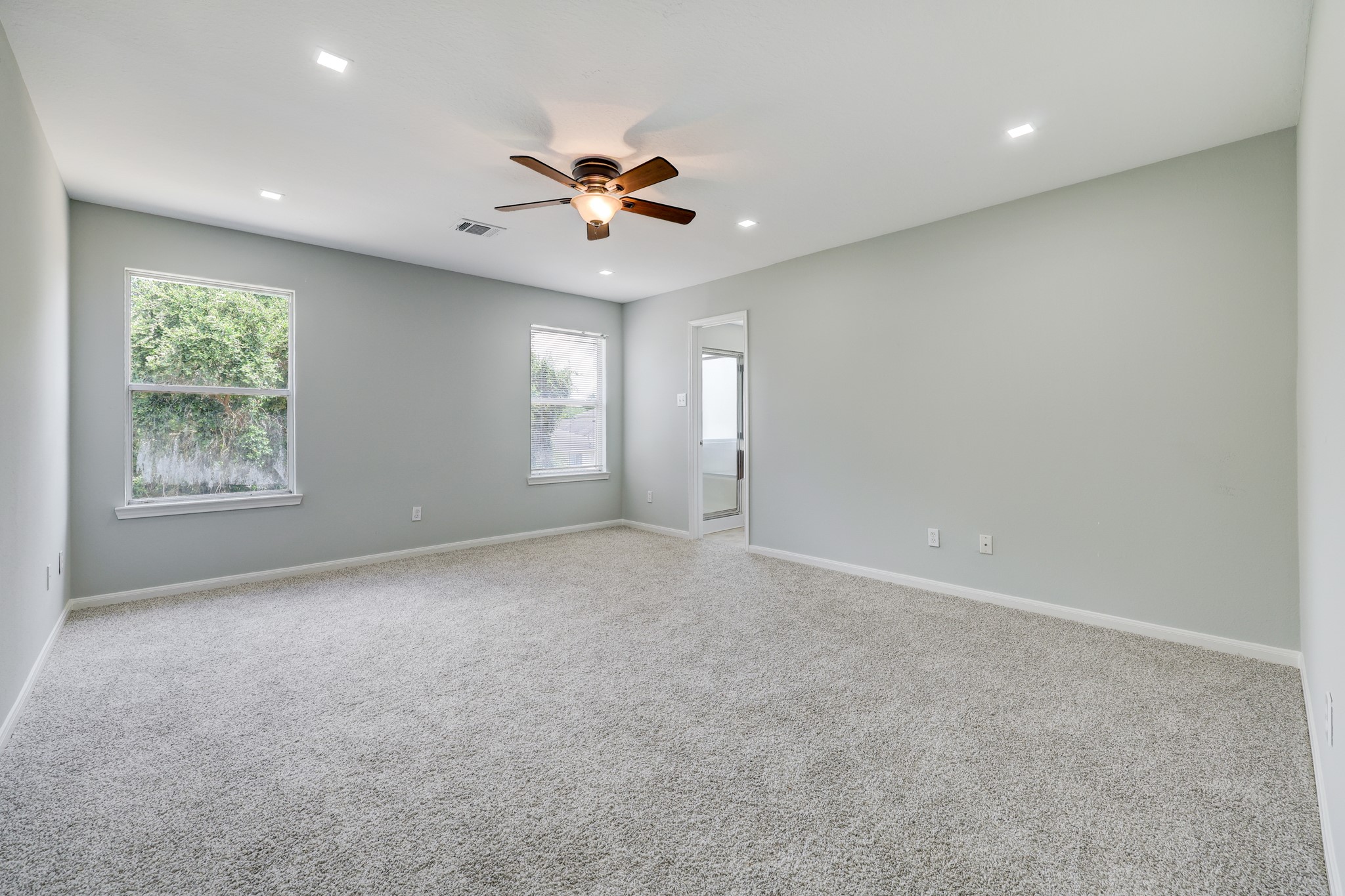 4906 Siros Isle Court Spring, TX 77389 - Photo 7 of 10 a view of an empty room with a window