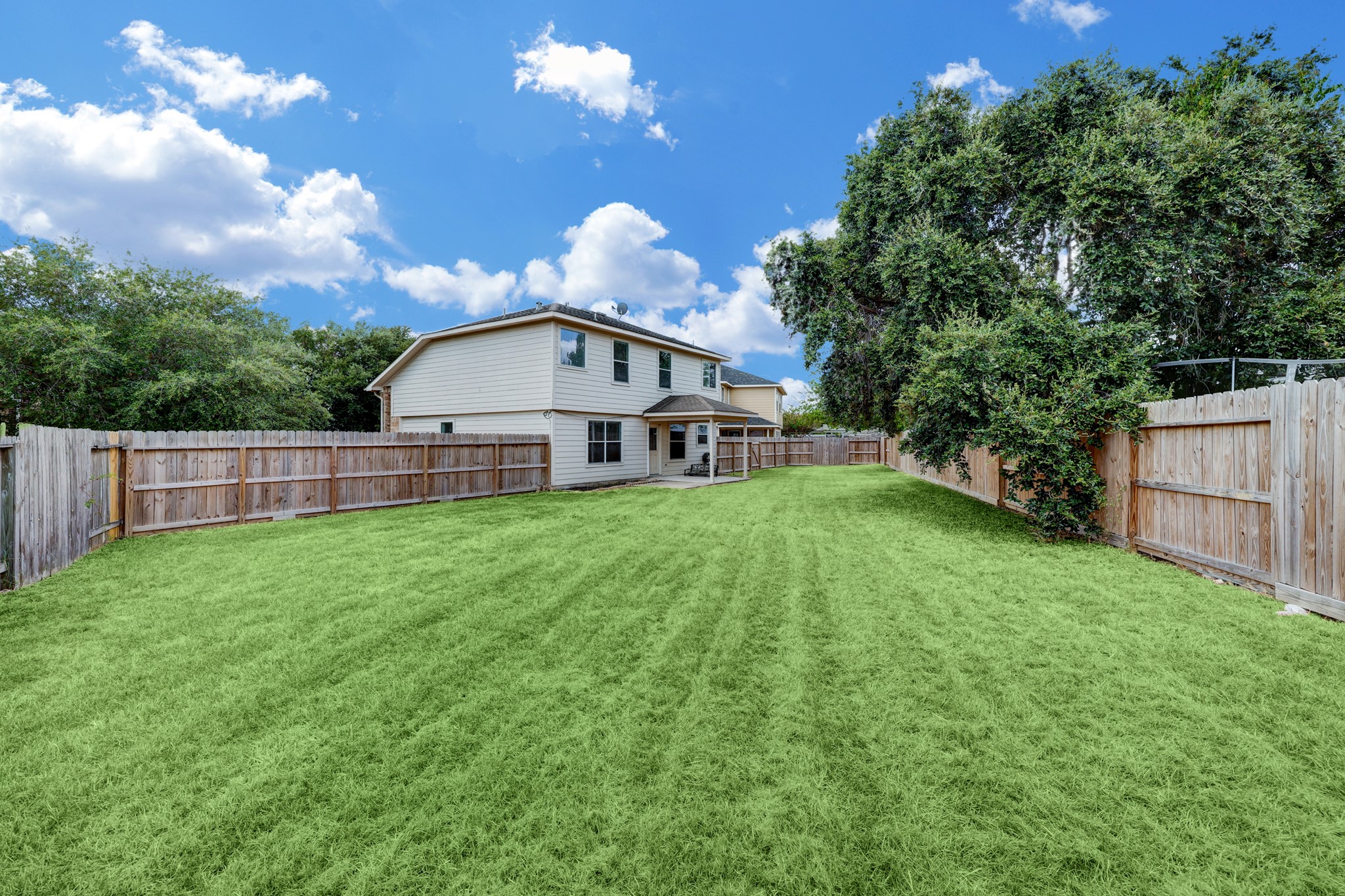 4906 Siros Isle Court Spring, TX 77389 - Photo 10 of 10 a view of a house with a yard and deck