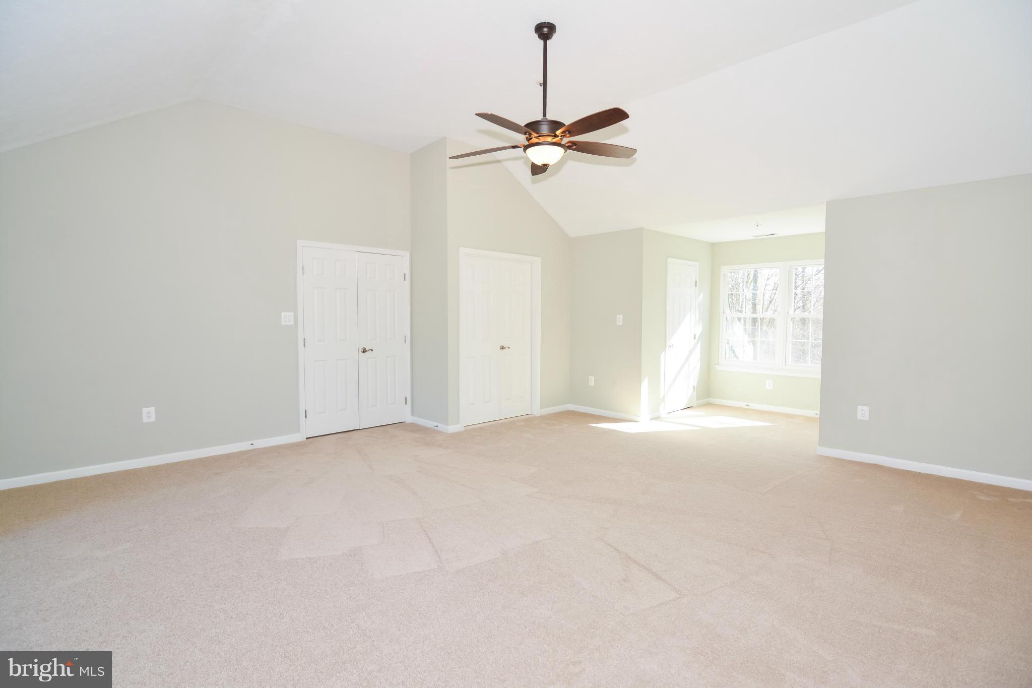 591 Small Reward Road Huntingtown, MD 20639 - Photo 18 of 30 a view of an empty room with a window