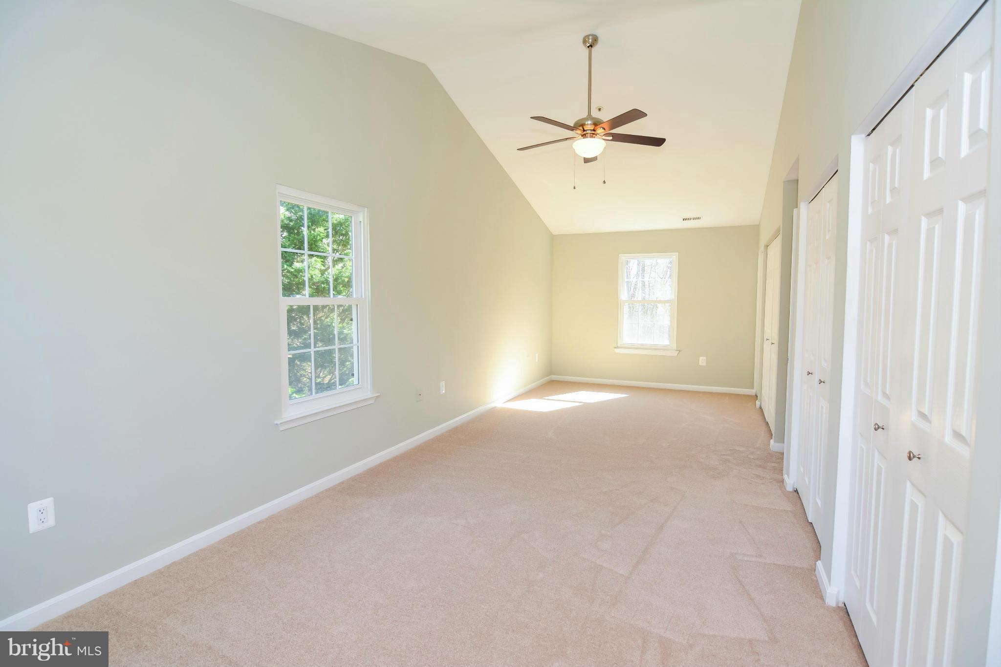 591 Small Reward Road Huntingtown, MD 20639 - Photo 24 of 30 a view of an empty room with a window