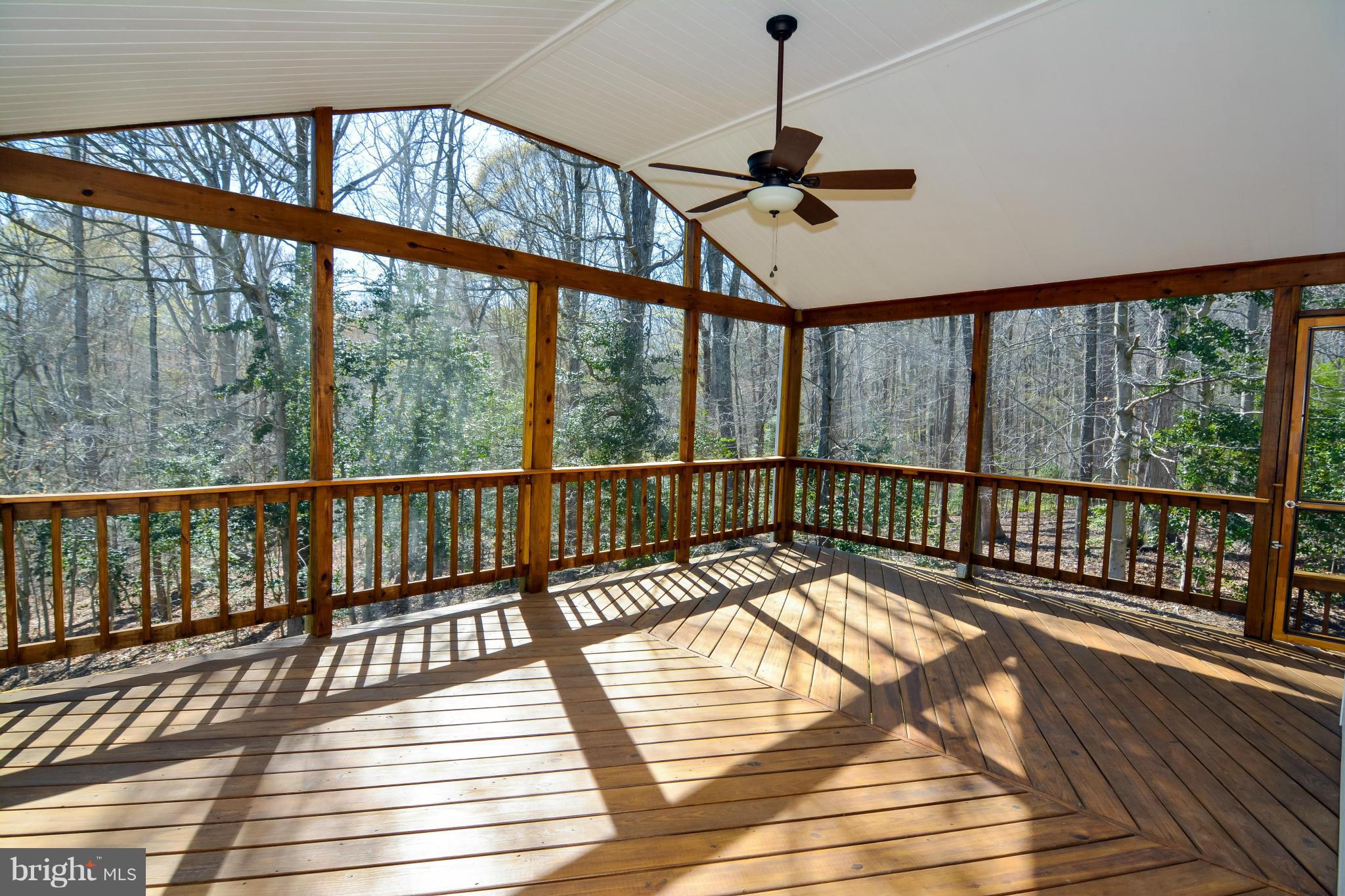 591 Small Reward Road Huntingtown, MD 20639 - Photo 26 of 30 a view of a balcony with wooden floor