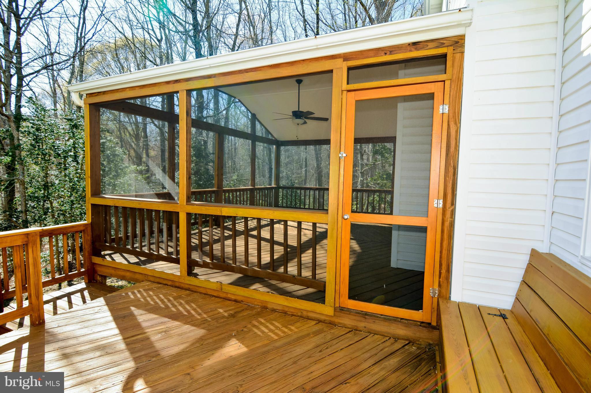 591 Small Reward Road Huntingtown, MD 20639 - Photo 27 of 30 a view of a balcony with wooden floor and fence