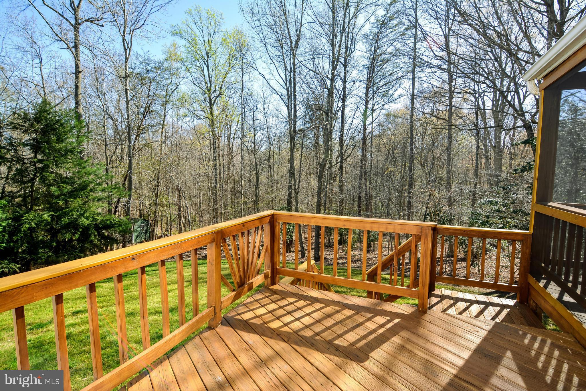 591 Small Reward Road Huntingtown, MD 20639 - Photo 28 of 30 a view of balcony with wooden floor and fence