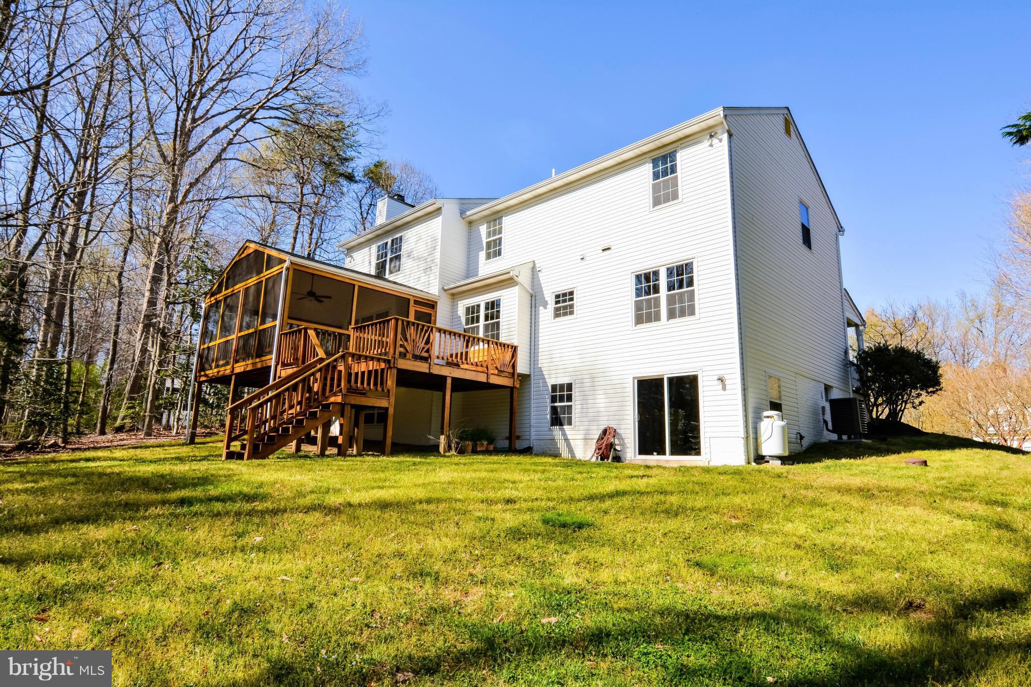 591 Small Reward Road Huntingtown, MD 20639 - Photo 4 of 30 a view of a house with a yard