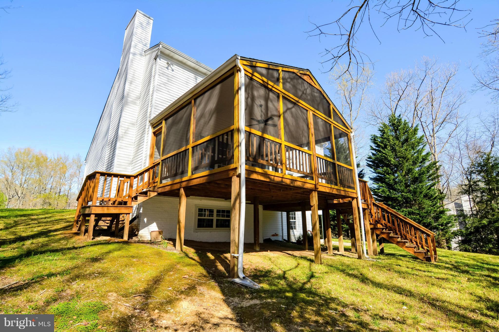 591 Small Reward Road Huntingtown, MD 20639 - Photo 5 of 30 a view of a house with a swimming pool