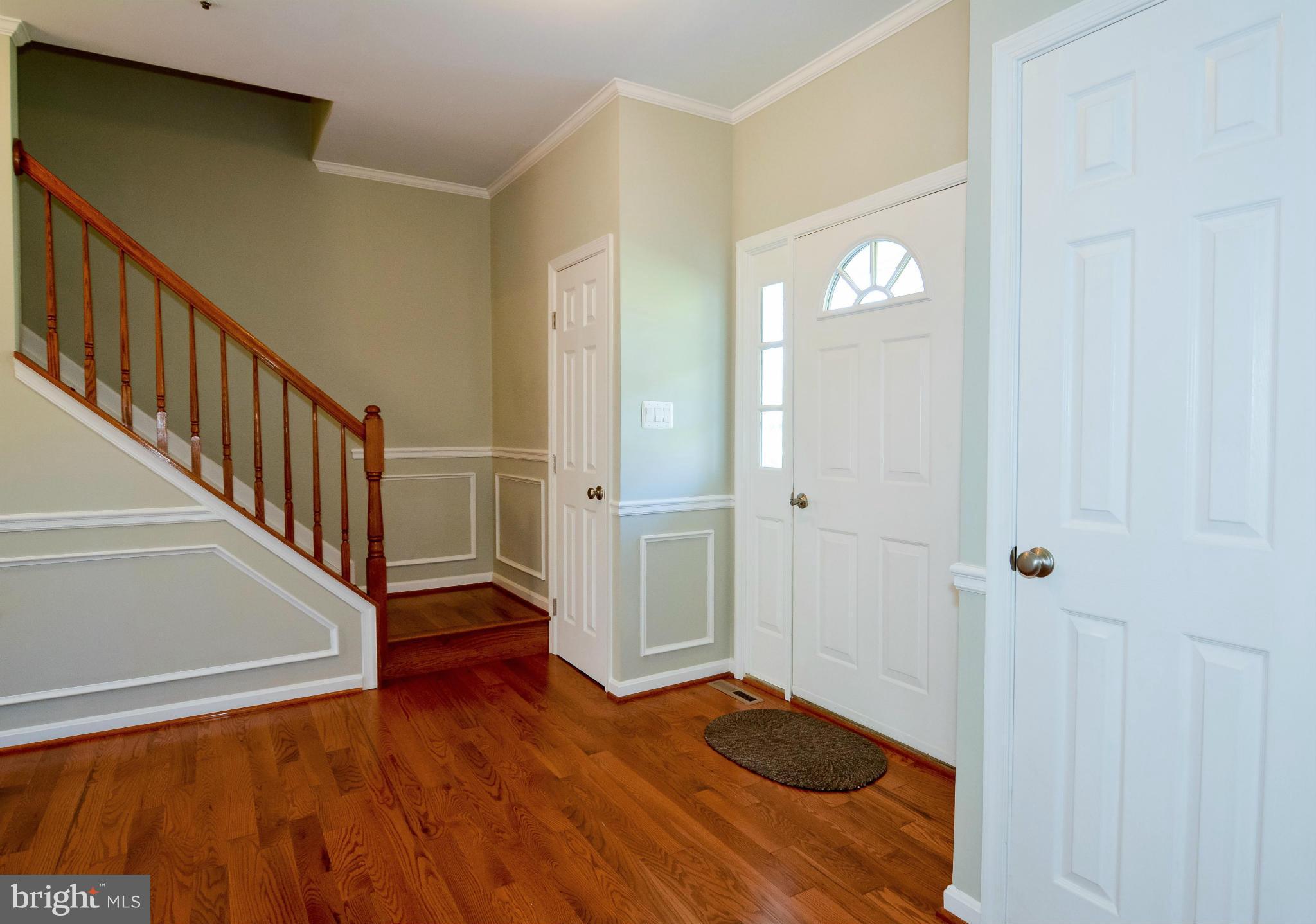 591 Small Reward Road Huntingtown, MD 20639 - Photo 7 of 30 a view of entryway with wooden floor