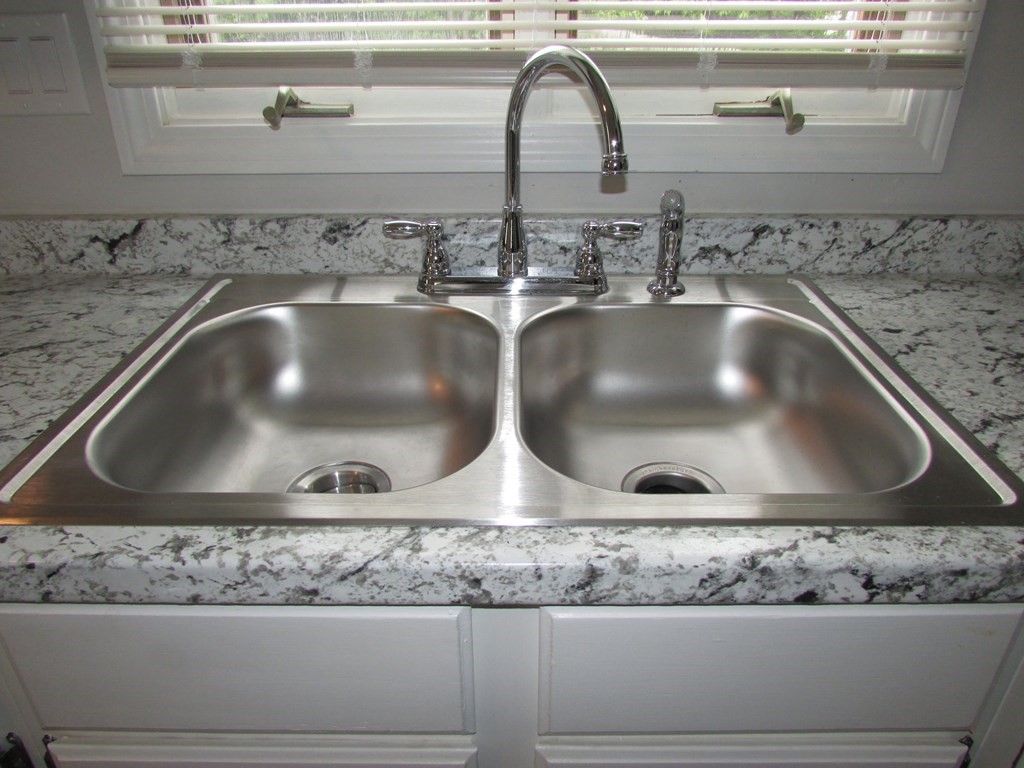 42-44 Wrentham Road Springfield, MA 01119 - Photo 13 of 31 a close view of sink and tap