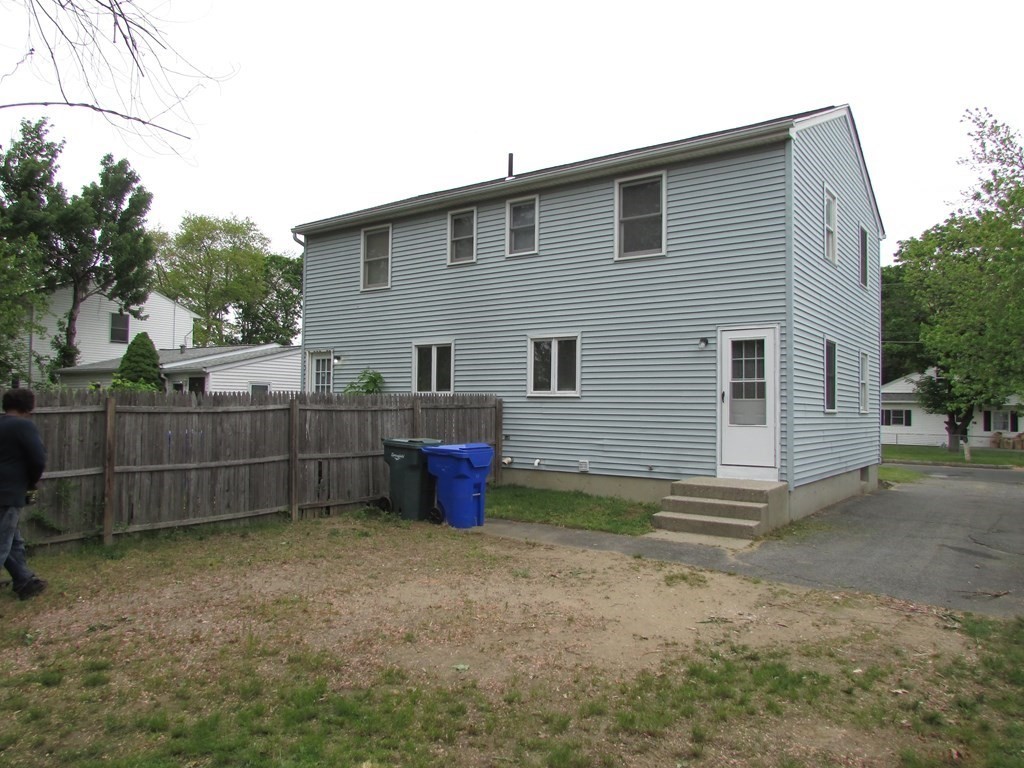 42-44 Wrentham Road Springfield, MA 01119 - Photo 7 of 31 a view of a backyard