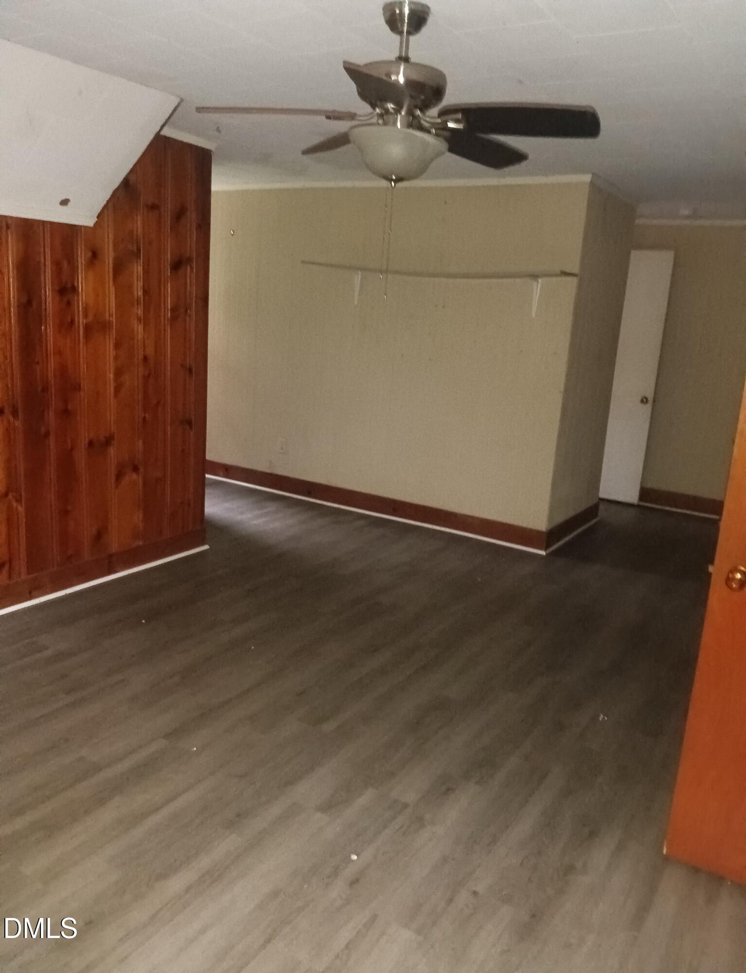 7856 Boston Road Roxboro, NC 27574 - Photo 16 of 18 a view of an empty room with wooden floor