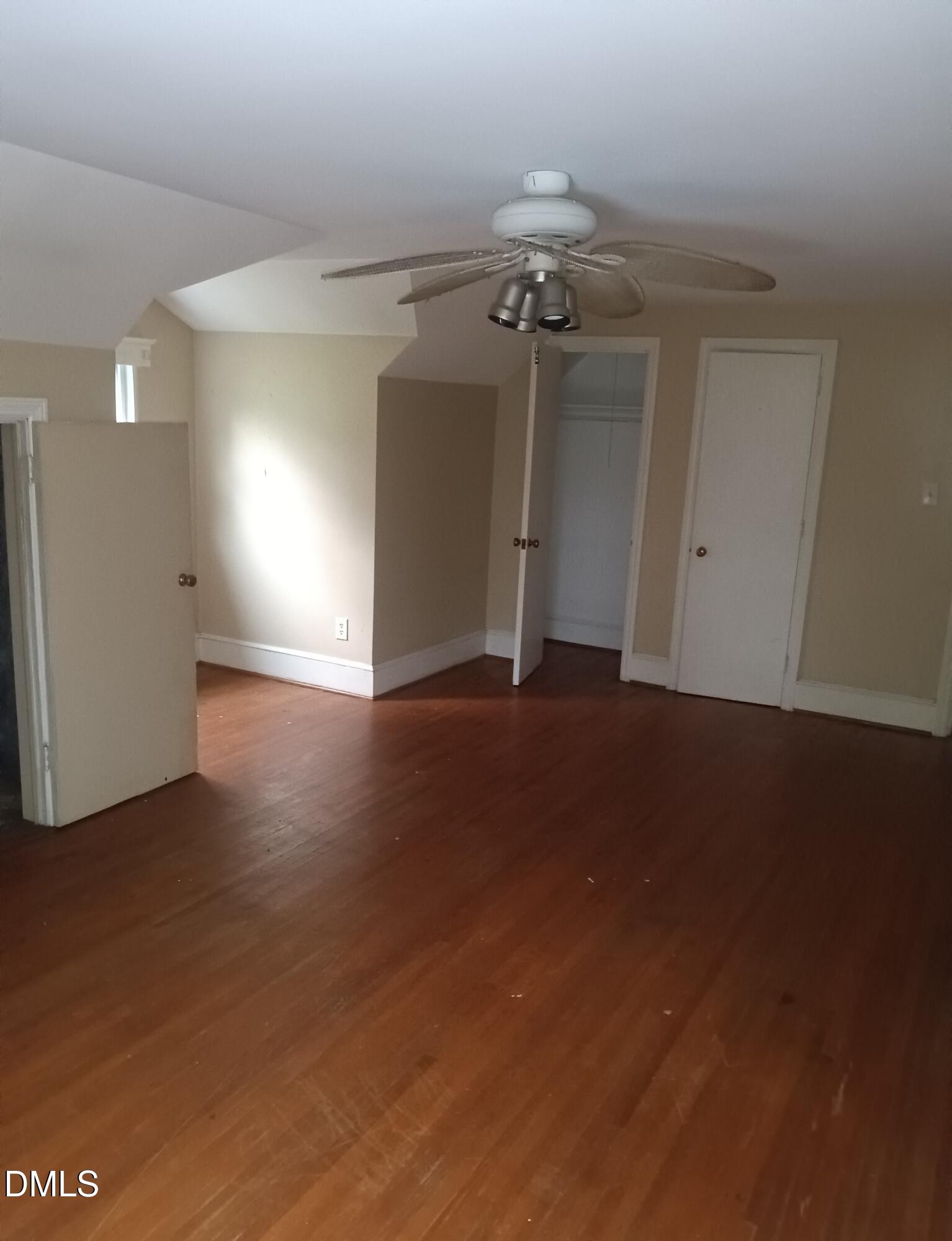 7856 Boston Road Roxboro, NC 27574 - Photo 18 of 18 a view of a livingroom with a ceiling fan and window