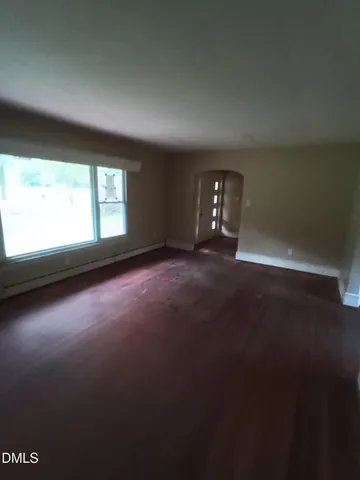 a view of a room next to a window