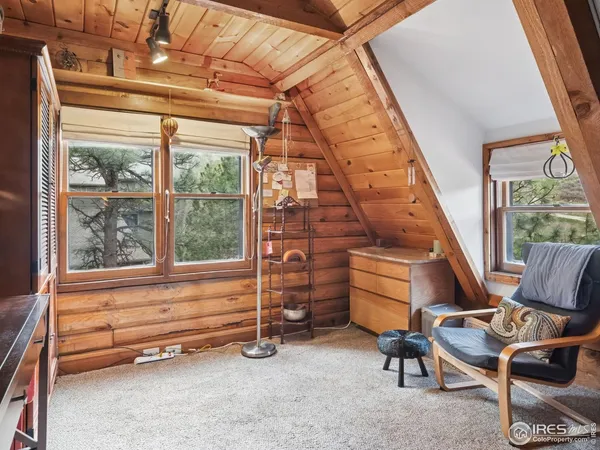 a room with furniture and a window