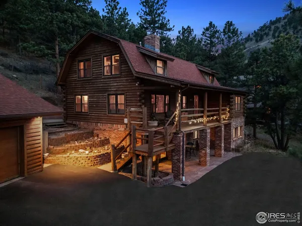 a view of a house with pool and porch