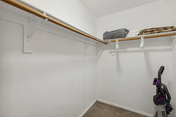 a view of a room with racks on the wall