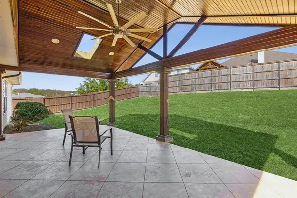 a view of yard with outdoor seating