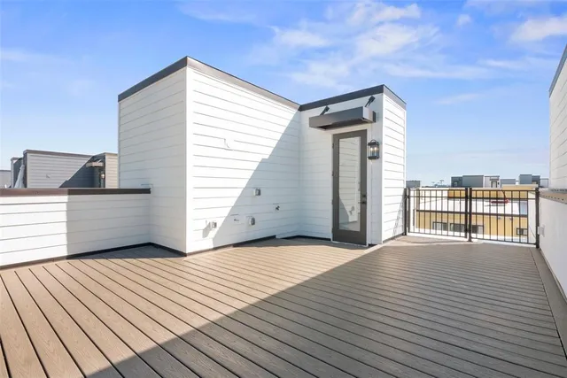 a view of balcony with furniture