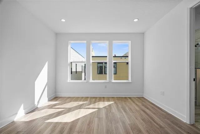 a bathroom with a sink toilet and a mirror