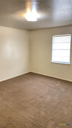 an empty room with a workbench