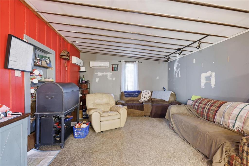 415 Tapley Road Villa Rica, GA 30180 - Photo 25 of 25 a living room with furniture and a couch