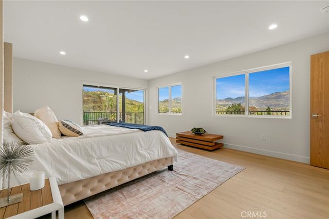 an aerial view of a house with outdoor space