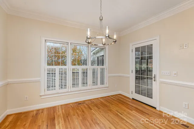 a view of a room with windows