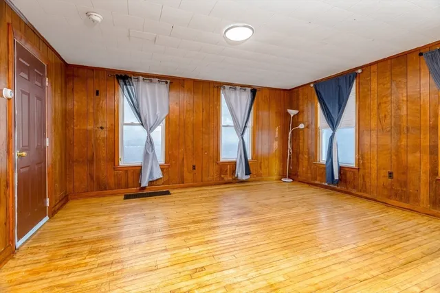 an empty room with windows