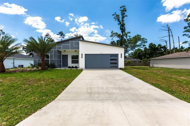a front view of house with yard
