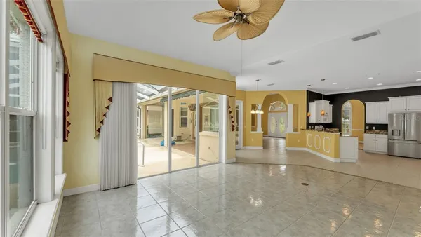 a large bathroom with a glass shower door