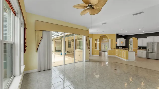 a large bathroom with a glass shower door