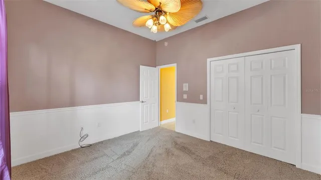 a view of a backyard with table and chairs