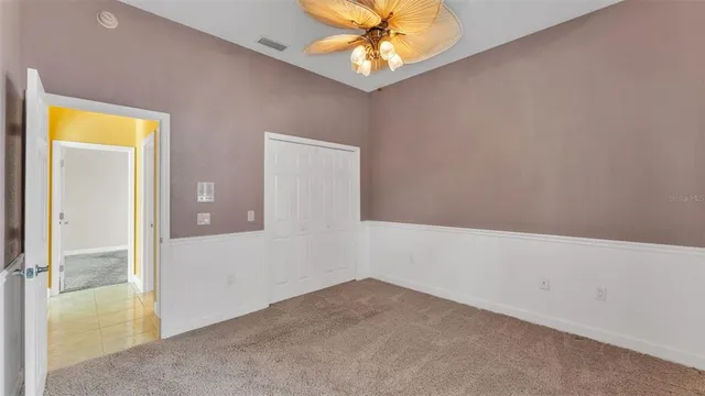 a view of a house with pool and porch