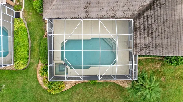 a backyard of a house with lots of green space