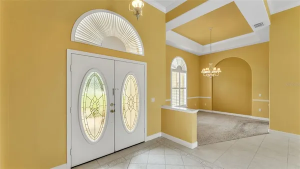 a view of a bathroom with dual sinks