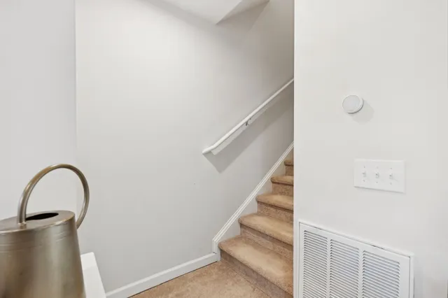 a bed room with a bed and a television