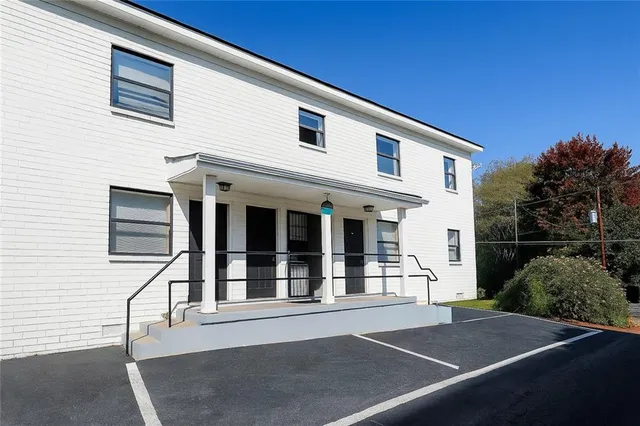 a view of a house with a large window