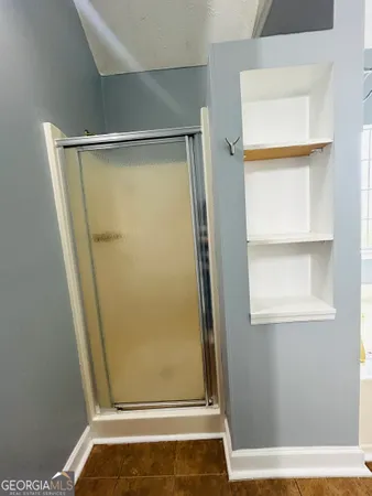 a view of entryway with wooden floor