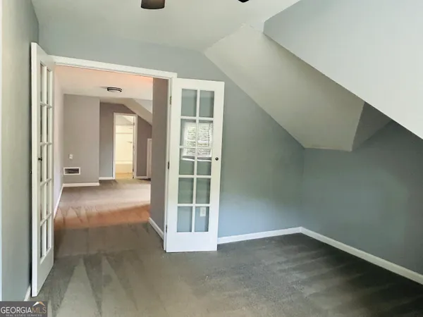 a view of a room with racks on the wall