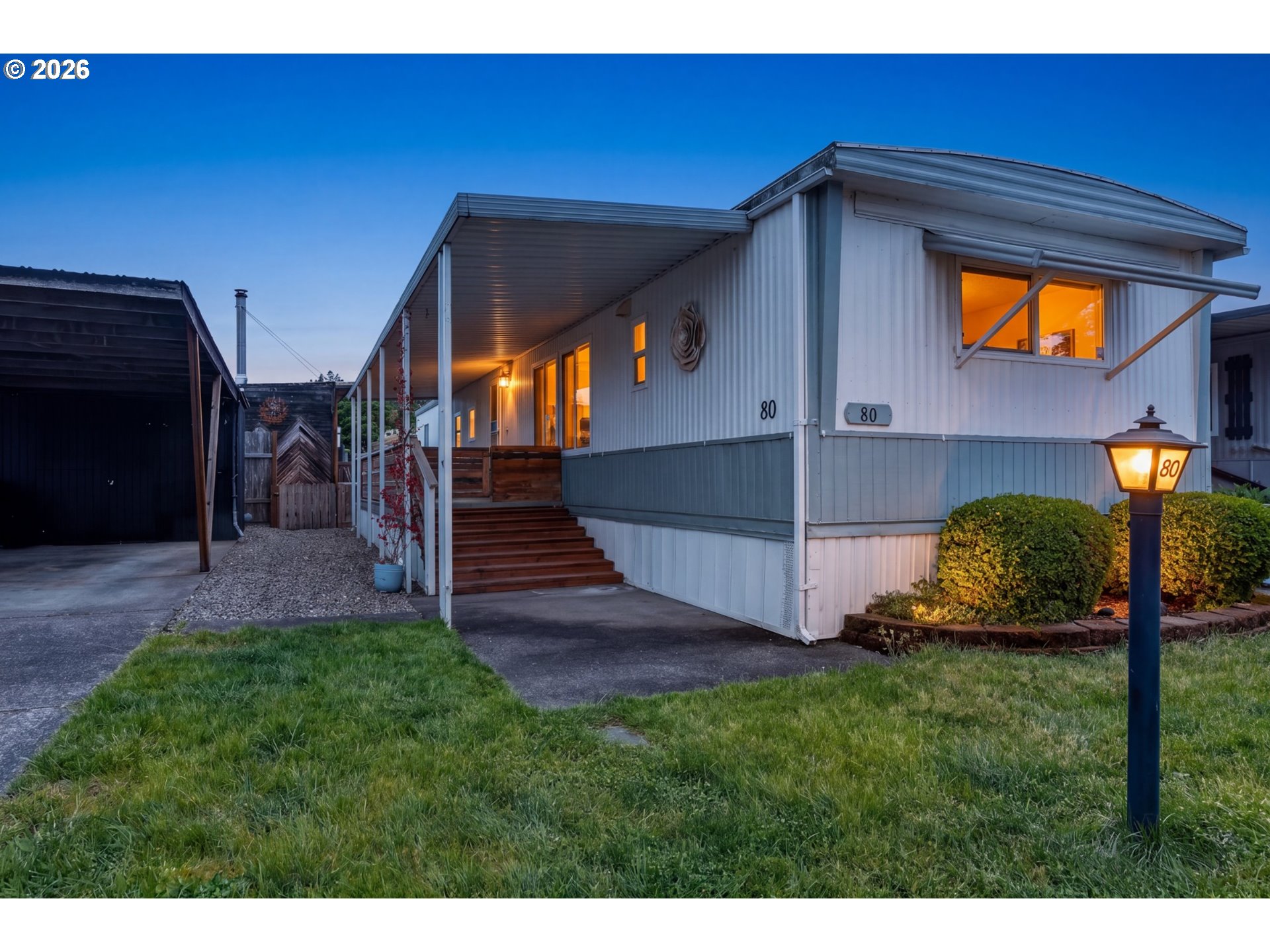 205 South 54th Street, Unit 80 Springfield, OR 97478 - Photo 1 of 37 a view of an house with backyard and deck