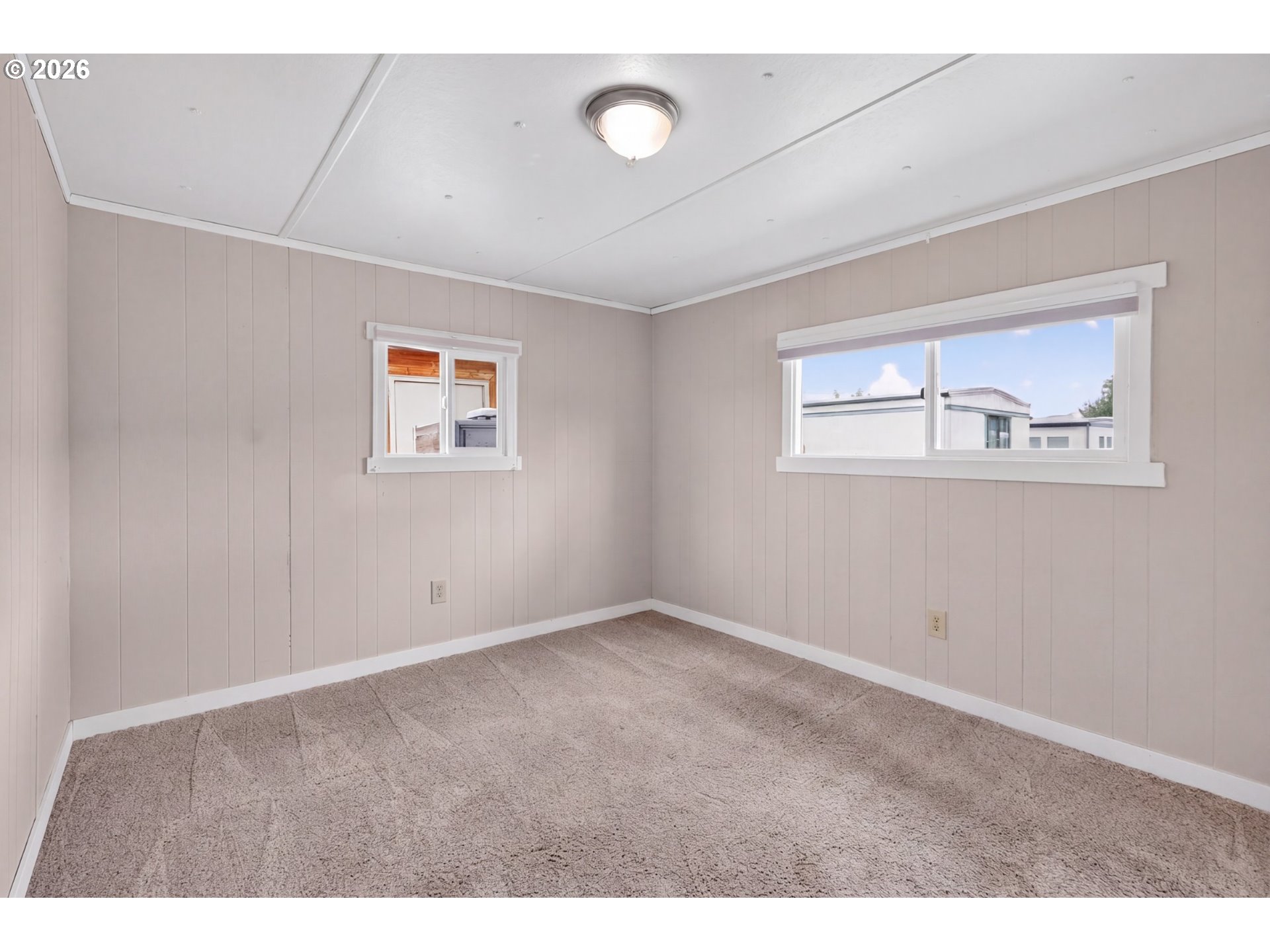 205 South 54th Street, Unit 80 Springfield, OR 97478 - Photo 18 of 37 a view of an empty room with a window