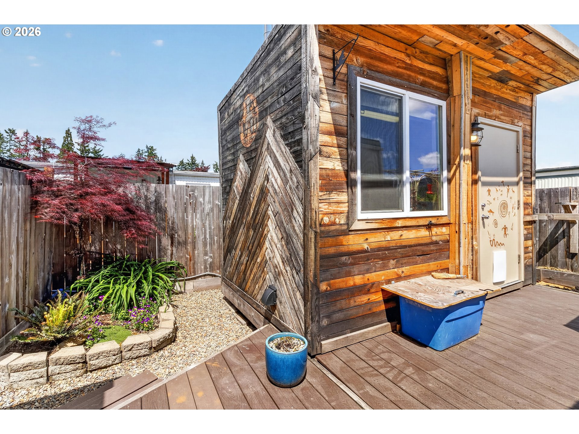 205 South 54th Street, Unit 80 Springfield, OR 97478 - Photo 2 of 37 a view of a two chair in the patio with potted plants