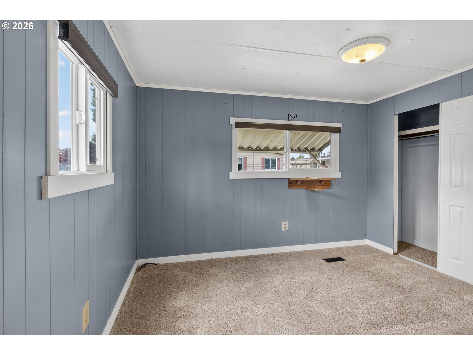 205 South 54th Street, Unit 80 Springfield, OR 97478 - Photo 24 of 37 a view of empty room with windows
