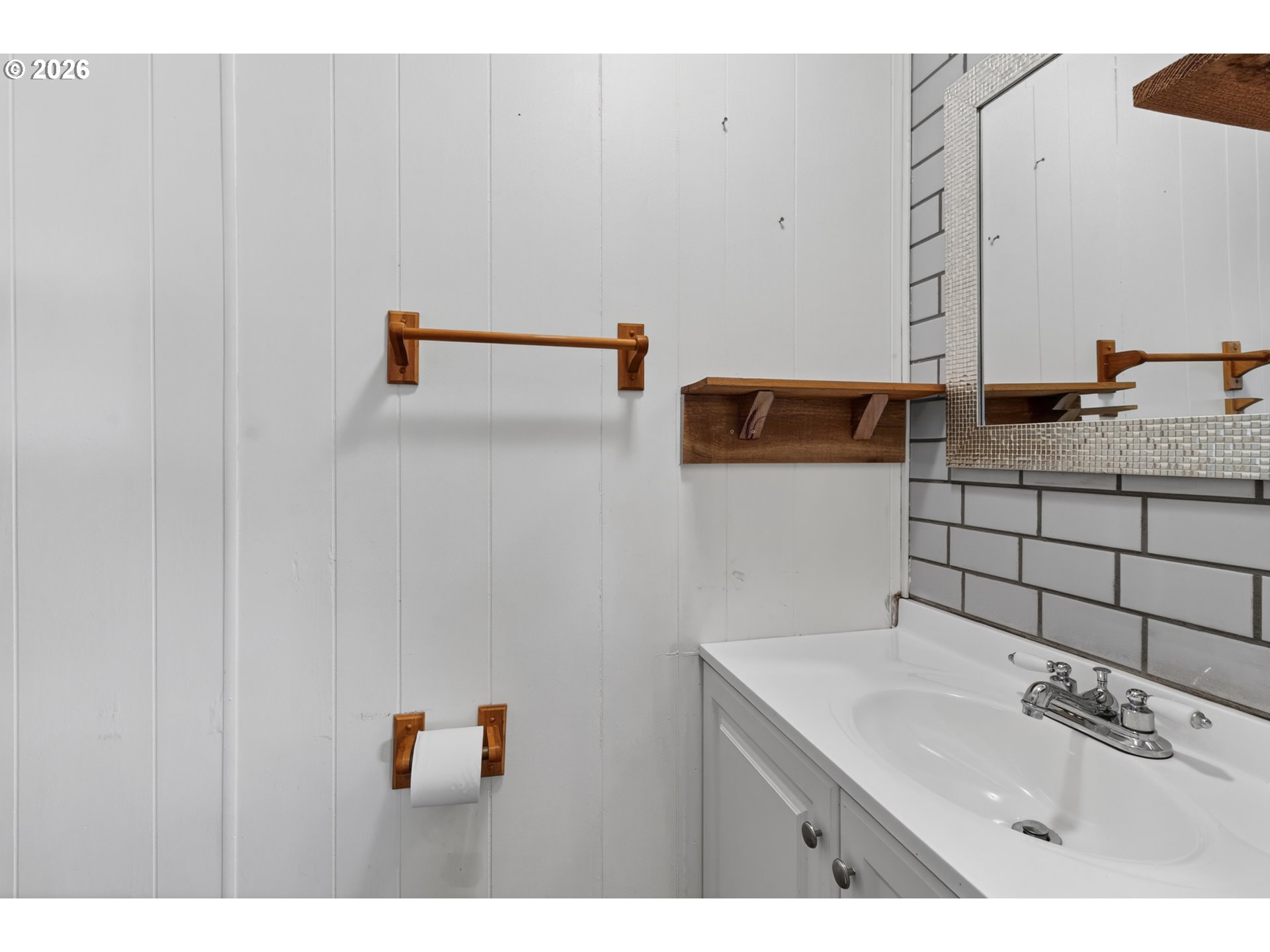 205 South 54th Street, Unit 80 Springfield, OR 97478 - Photo 27 of 37 a bathroom with a sink and a mirror